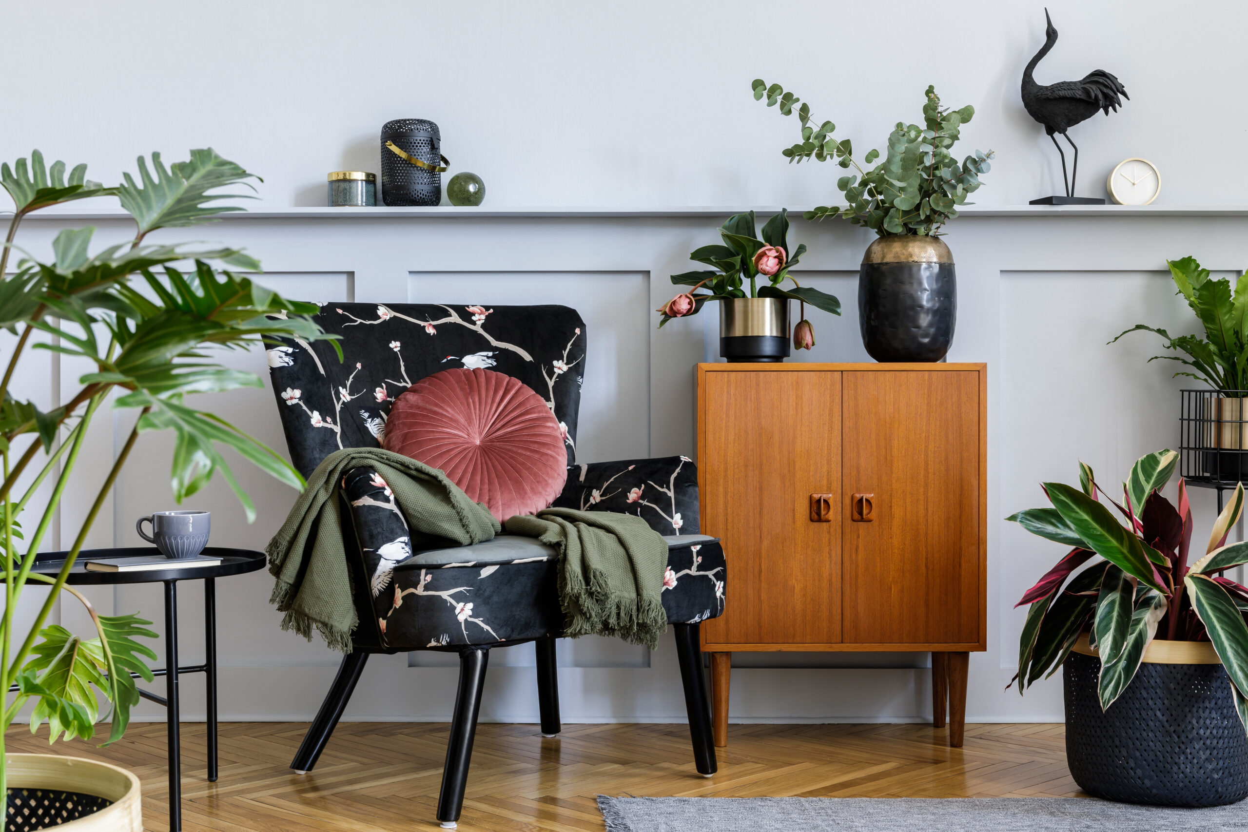 Modern interior of living room with design armchair, wooden vint